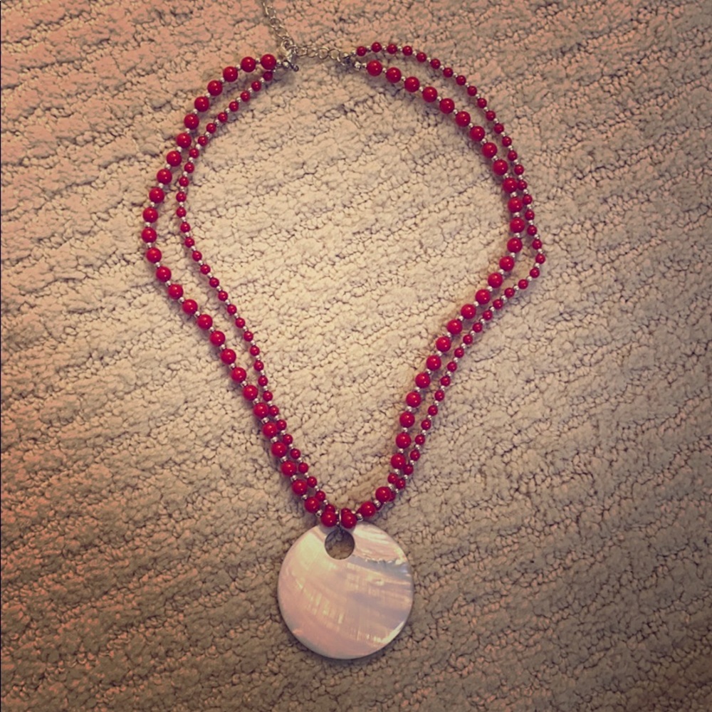 Red beaded necklace with pearlized pendant